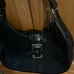 Coach black leather buckle bag